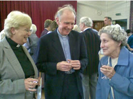 Patsy Critchley (left) speaking with John Harper and Brenda after her ordination as Deacon
