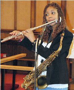 Sandra Grant playing her flute at St Michael's