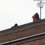Zero degrees (centigrade) and a raw, biting wind did not stop our steeplejacks getting on with the job...